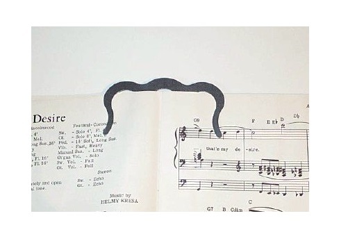 Keep music book pages open - perfect for gigs